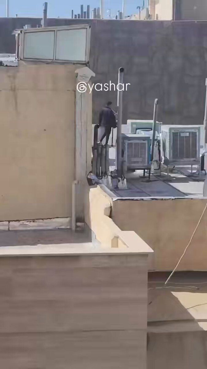 @Goldie Ghamari | گلسا قمری 🇮🇷: An Iranian man is casually smoking a hookah while standing on his rooftop watching the United States and Israel destroy IRGC facilities in the city of Karaj.
This is peak Iranian. All he's missing ar