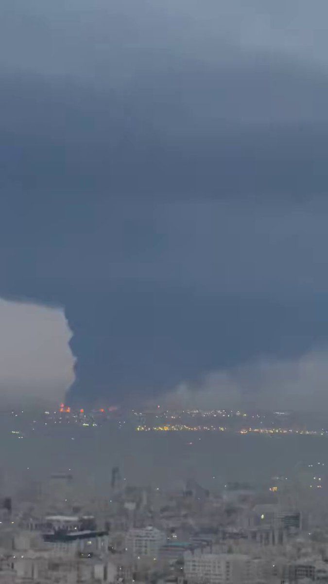 @Babak Taghvaee - The Crisis Watch: BREAKING: It is raining oil in Tehran, the capital city of Iran. As a result of oil burning from multiple energy facilities in the city—including the oil reserves of Shahran, Aghdasiyeh, and Shahre Re