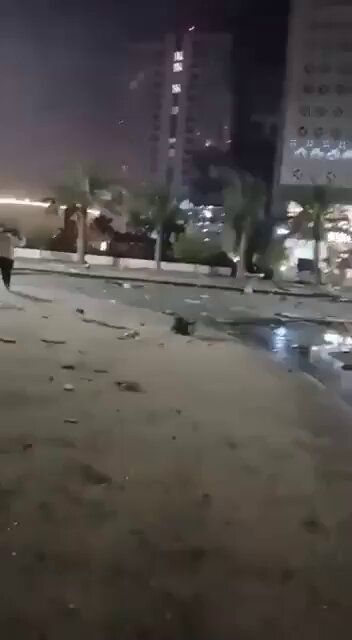 @Babak Taghvaee - The Crisis Watch: BREAKING: The IRGC Aerospace Force targeted another skyscraper or residential building that they claimed was housing U.S. Navy personnel in Manama, Bahrain. The building was targeted using a one-way a