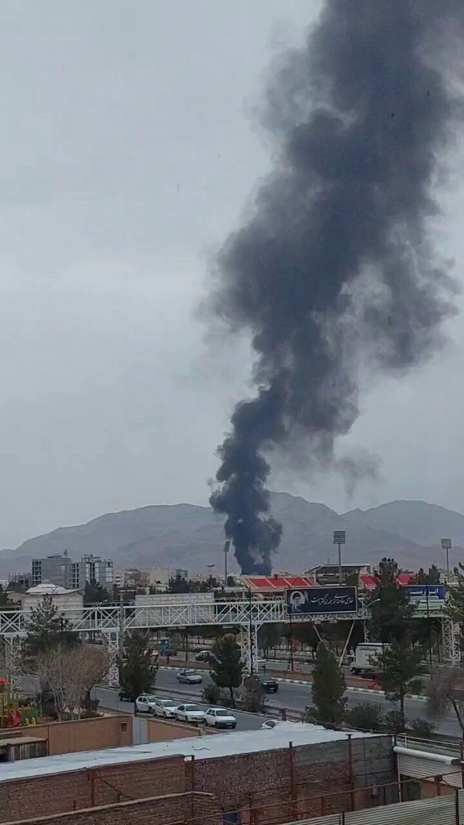@Babak Taghvaee - The Crisis Watch: BREAKING: Today, the U.S. Navy targeted and destroyed the fuel reserve area of Kerman International Airport in central Iran. You can see a plume of smoke rising as a result of the airstrike at the air