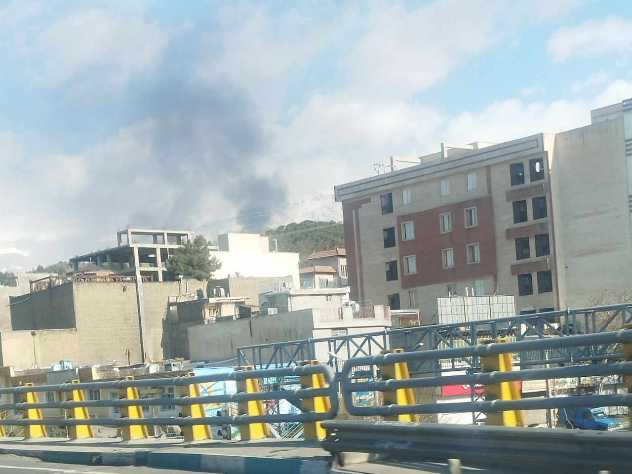 @Vahid Online: Received images with description: #Tehran Monday 10 Farvardin 7:45 AM, smoke from the bombing of the Shiyan area'
#Iran #Tehran