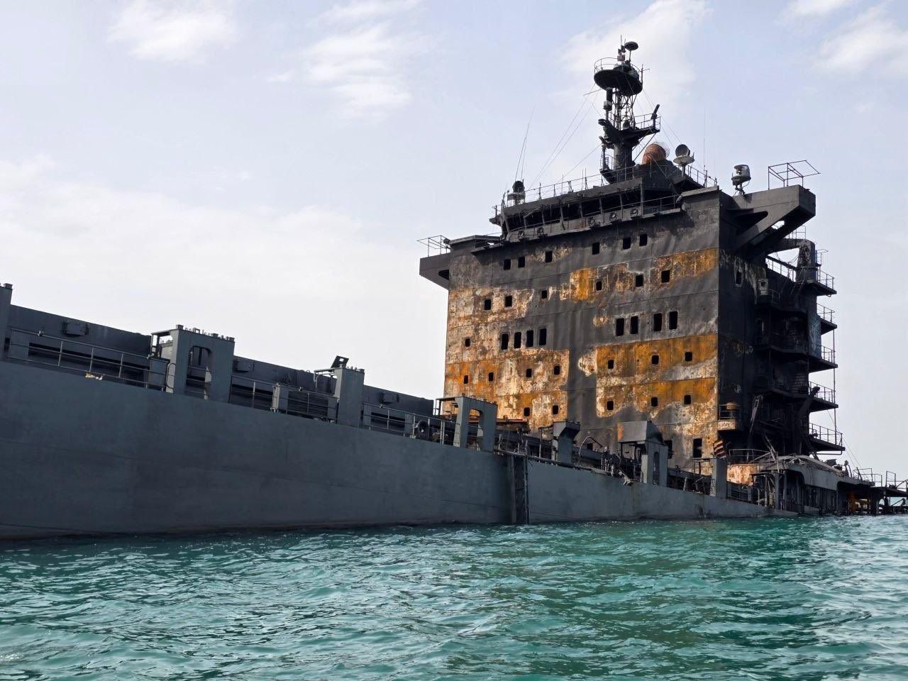 @🇮🇷LiveIranNews🇮🇱: 🚨🇺🇸🦀Image of the ship known as the floating base Martyr Mahdavi of the terrorist IRGC Navy, which was destroyed following US airstrikes.