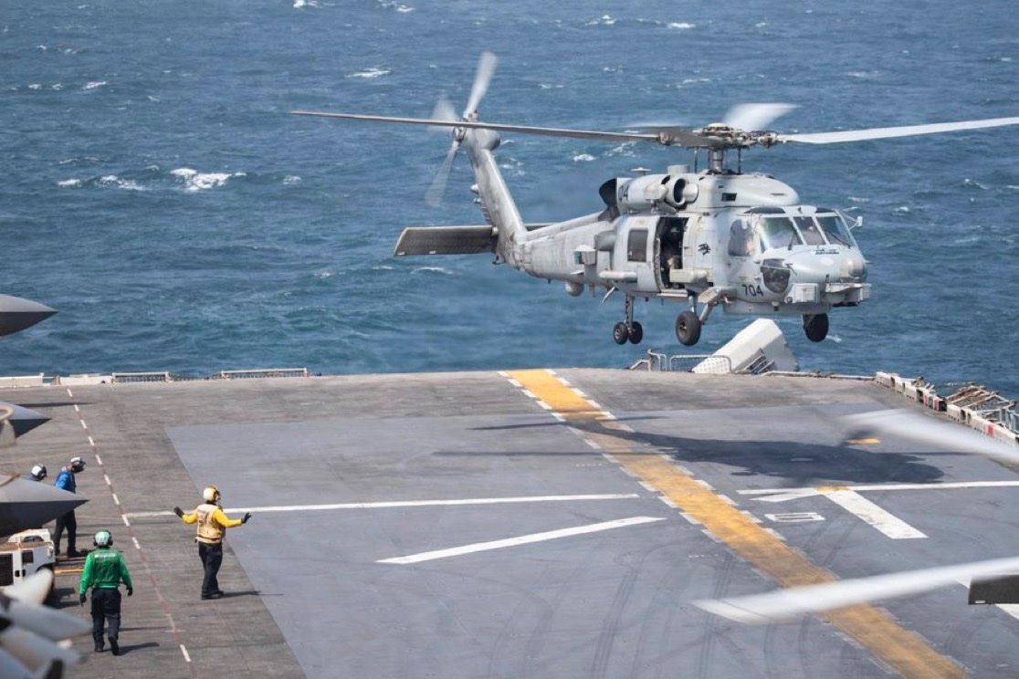 @Open Source Intel: U.S. Central Command (CENTCOM):
"A U.S. Navy MH-60R Sea Hawk helicopter prepares to land on the flight deck aboard USS Boxer (LHD 4). Boxer is the flagship for the Boxer Amphibious Ready Group / 11th