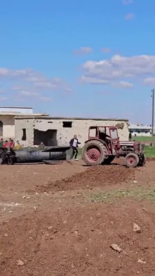 @Babak Taghvaee - The Crisis Watch: #Breaking: This footage shows farmers removing debris of an intermediate-range ballistic missile of the #IRGC Aerospace Force that had been launched from #Iran toward #Israel. The missile appears to b