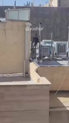 @Goldie Ghamari | گلسا قمری 🇮🇷: An Iranian man is casually smoking a hookah while standing on his rooftop watching the United States and Israel destroy IRGC facilities in the city of Karaj.

This is peak Iranian. All he's missing ar