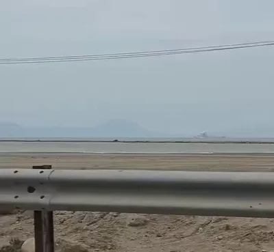 @Babak Taghvaee - The Crisis Watch: This video, recorded during the first day of the war, shows an Iranian Navy warship on fire near Qeshm Island in the Strait of Hormuz in southern Iran after being struck by the U.S. Navy during the fi