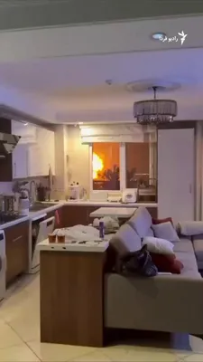 @RadioFarda‌|‌راديو فردا: A video published on social media shows the moment of a large explosion in Tehran due to an airstrike, which is said to have been recorded early Saturday morning, March 7, from inside a house in weste