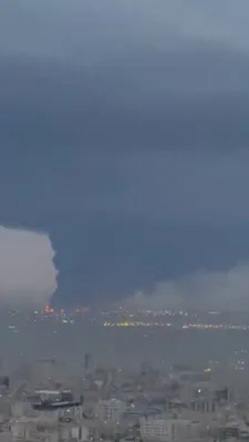 @Babak Taghvaee - The Crisis Watch: BREAKING: It is raining oil in Tehran, the capital city of Iran. As a result of oil burning from multiple energy facilities in the city—including the oil reserves of Shahran, Aghdasiyeh, and Shahre Re