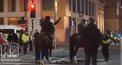 @Visegrad 24: Outrage in UK after pro-Khamenei Islamists on horses are allowed to chase anti-Khamenei protesters at an Islamist vigil for Khemenei in Manchester.

Asked why it’s allowed, a policeman says “should I 