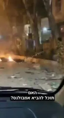 @Eli Afriat 🇮🇱: Footage from the attacked Basij checkpoint: A Basij operative is heard at a loss, shouting into the phone because none of the officers are answering them.