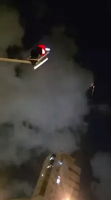 @Babak Taghvaee - The Crisis Watch: BREAKING: Video from tonight in Haifa, northern Israel, shows debris from a ballistic missile launched by the IRGC Aerospace Force and intercepted by an IDF anti-ballistic missile system crashing into