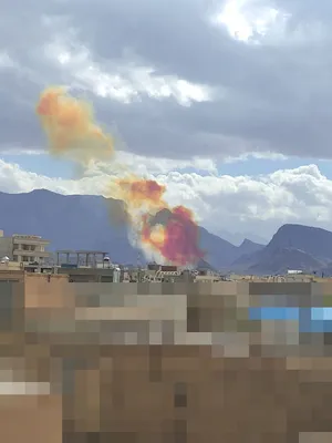 @Vahid Online: #Yazd around 14:20'
Images received of red and orange smoke
A citizen who sent a photo with the caption 'The moment a missile is launched from the IRGC missile base in the mountains behind Koohstan Pa