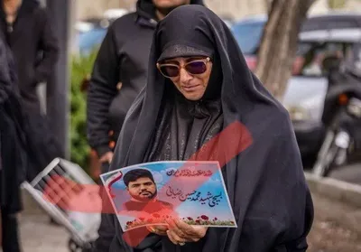 @🇮🇷LiveIranNews🇮🇱: 🚨🦀Your screams are being heard  
The ground is turning bad  
Image of Mohammad Hossein Rezaei, a Basiji from Kashan who was martyred during an attack on a checkpoint in Tehran.