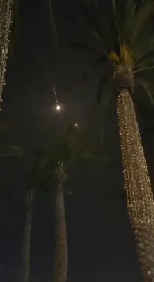 @Babak Taghvaee - The Crisis Watch: BREAKING: Video recorded in Eilat in southern Israel shows the moment another hypersonic ballistic missile of the IRGC Aerospace Force hit the city. Two surface-to-air missiles launched by the IDF fai