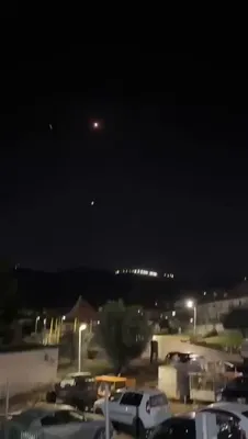 @Babak Taghvaee - The Crisis Watch: BREAKING: One of the ballistic missiles launched by the IRGC Aerospace Force at Israel tonight had its warhead section impact somewhere in the country. As seen in the footage, surface-to-air missiles 
