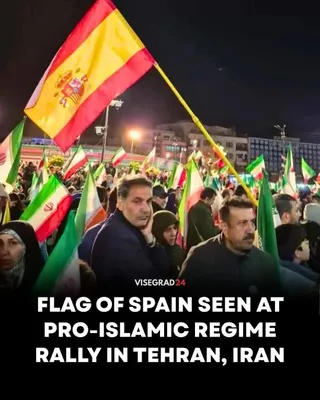 @Visegrád 24: 🇪🇸🇮🇷 The flag of Spain was seen during a recent pro-Islamic regime protest in Tehran, Iran.

Spain's far-left socialist Prime Minister Pedro Sánchez is one of the few leaders who openly wage anti-