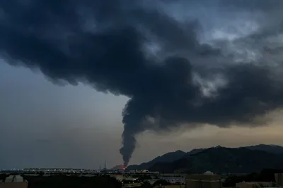 @Babak Taghvaee - The Crisis Watch: BREAKING: These are the first images showing a petrochemical plant in Fujairah, UAE, on fire as a result of one-way attack drone strikes by the IRGC Aerospace Force using Shahed-136 one-way attack dro