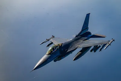 @U.S. Central Command: A U.S. Air Force F-16 fighter jet patrols near the Strait of Hormuz. U.S. forces have a large amount of capability and firepower concentrated in and around the strait to extend a defensive umbrella to