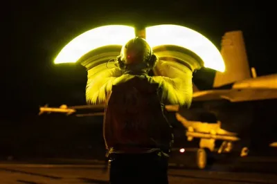 @Open Source Intel: U.S. Central Command (CENTCOM):

"U.S. Sailors conduct night flight operations aboard USS George H.W. Bush (CVN 77). At night, highly skilled pilots are able to land on a small deck that is both pitch