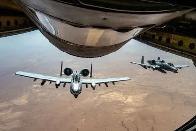 @Open Source Intel: U.S. Central Command (CENTCOM):

"Two U.S. Air Force A-10 attack aircraft fly together over the Middle East during a routine patrol. U.S. forces continue to be present in the skies, on land, and at se