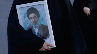 @✡︎𝐋𝐢𝐯𝐞𝐈𝐫𝐚𝐧𝐍𝐞𝐰𝐬🇮🇷🇮🇱: 🚨Ambiguity about Mojtaba Khamenei's presence at the funeral ceremony of his jackass father/In the meantime, while the funeral ceremony of the leader of the terrorist regime of the Islamic Republic ha