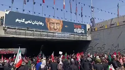@Open Source Intel: Mourners at Supreme Leader Ali Khamenei's funeral threw stones at an image of U.S. President Donald Trump while chanting "America is the Great Satan."
