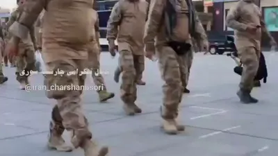 @Babak Taghvaee - The Crisis Watch: BREAKING: These big-breasted men, as you can see, are members of the Fatehin Special Forces of the IRGC Ground Forces tasked with protecting funeral of dictator Khamenei in Tehran, Iran, today. The re