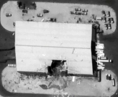 @Open Source Intel: Satellite imagery appears to show an Iranian ballistic missile strike on a equipment warehouse at the U.S. Al Udeid Air Base in Qatar.
