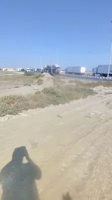 @Babak Taghvaee - The Crisis Watch: BREAKING: A video recorded by a civilian truck driver in Sirik, southern Iran, near the Strait of Hormuz, appears to show the aftermath of one of the recent U.S. military strikes in southern Iran. Acc