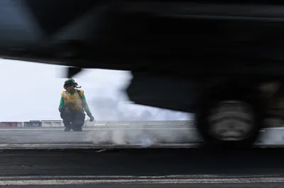 @Open Source Intel: U.S. sailors aboard the USS George H.W. Bush (CVN 77) monitor F/A-18E Super Hornet fighter jets launching from the carrier deck while sailing in the Arabian Sea. - CENTCOM