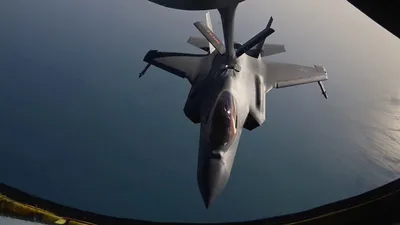 @Open Source Intel: CENTCOM: A U.S. Air Force F-35A stealth fighter jet is refueled by a KC-135 Stratotanker while patrolling regional waters over the Middle East.