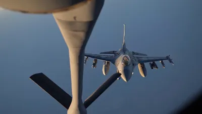 @Open Source Intel: CENTCOM: A U.S. Air Force KC-135 Stratotanker refuels F-16 fighter jets and a KC-46 Pegasus while flying over the Middle East.