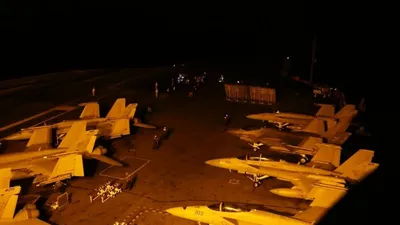 @Open Source Intel: CENTCOM:

"U.S. Sailors conduct nighttime flight operations aboard USS George Washington (CVN 73) while the aircraft carrier sails in the Arabian Sea."