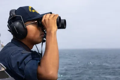 @U.S. Central Command: A U.S. Sailor stands watch aboard USS John Paul Jones (DDG 53) as the guided-missile destroyer continues to support the U.S. blockade against Iran in regional waters. As of Sept. 3, CENTCOM forces hav