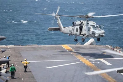 @Open Source Intel: U.S. Central Command (CENTCOM):

"A U.S. Navy MH-60R Sea Hawk helicopter prepares to land on the flight deck aboard USS Boxer (LHD 4). Boxer is the flagship for the Boxer Amphibious Ready Group / 11th